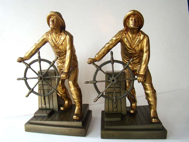 A pair of vintage Bookends circa 1925 depicting the Memorial to honor the GLOUCESTER FISHERMAN
